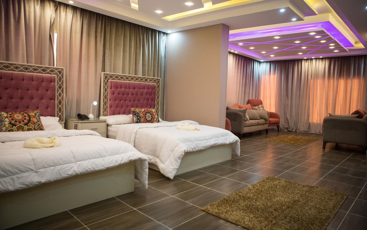 Suite Queen Deluxe con Vista Piramidi